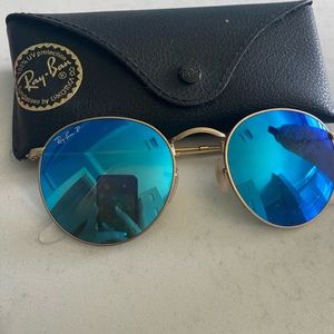 Round blue lens ray bans